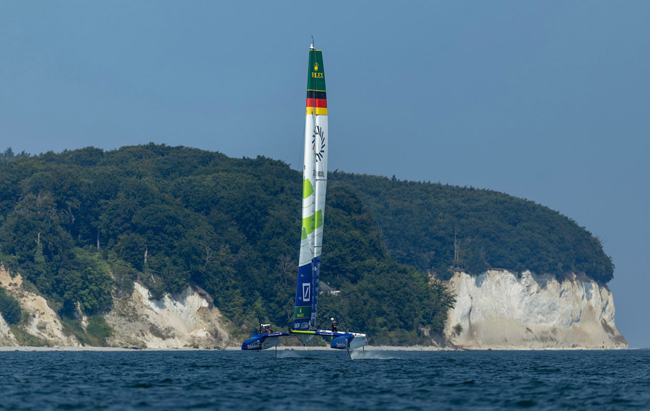 Germany SailGP Team presented by Deutsche Bank helmed by Erik Heil in action during a practice session ahead of the Germany Sail Grand Prix in Sassnitz, Germany. Friday 15 August 2025. Rolex SailGP Championship Event 8 Season 2025. Photo: Felix Diemer for SailGP. Handout image supplied by SailGP